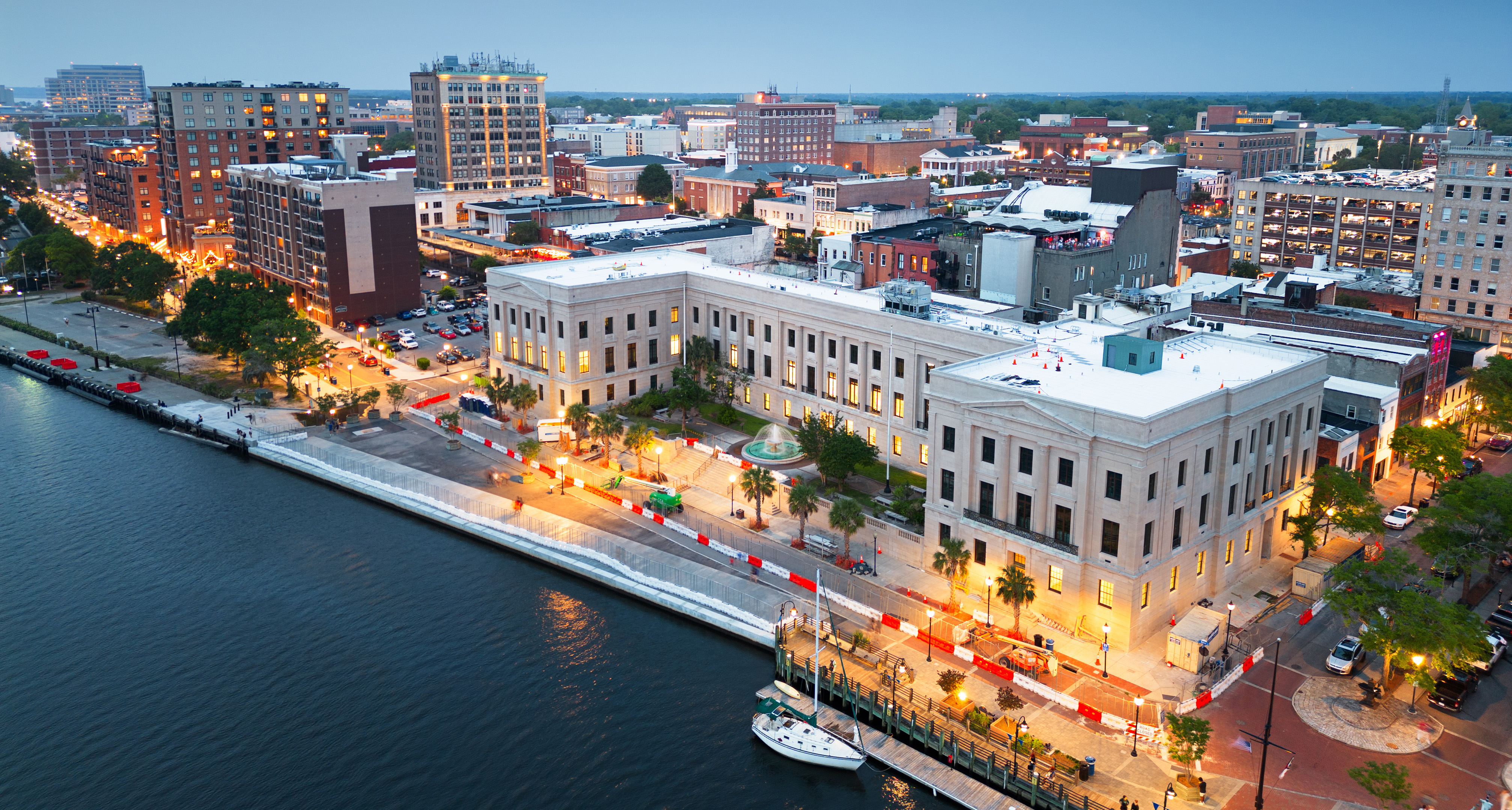 Wilmington, North Carolina, USA aerial cityscape at dusk.